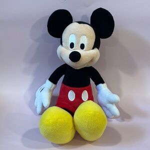 Disney Parks Exclusive 13” long Mickey Mouse Plush Toy Excellent Used Condition